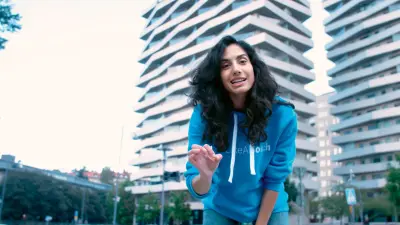 Woman in front of a building